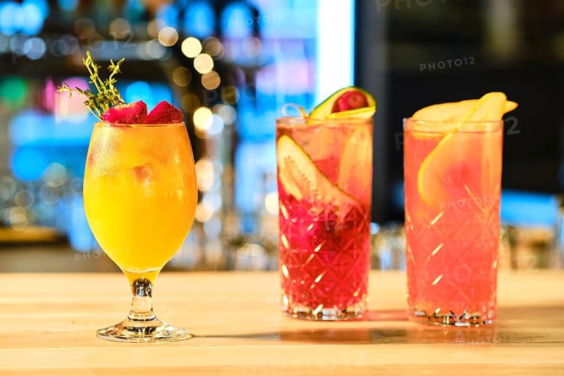 Three glass of cold lemonade on the barcounter
