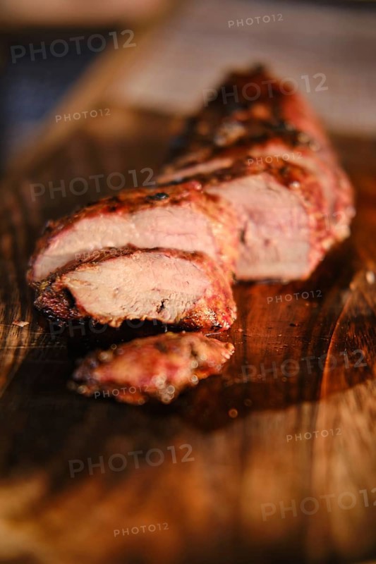 Closeup view of grilled juicy and spicy duck breast steak