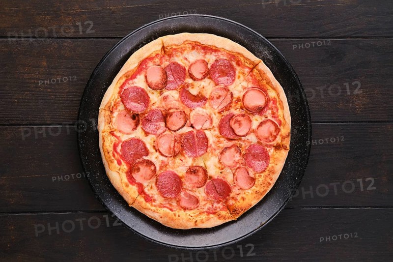 Simple pizza with sausages