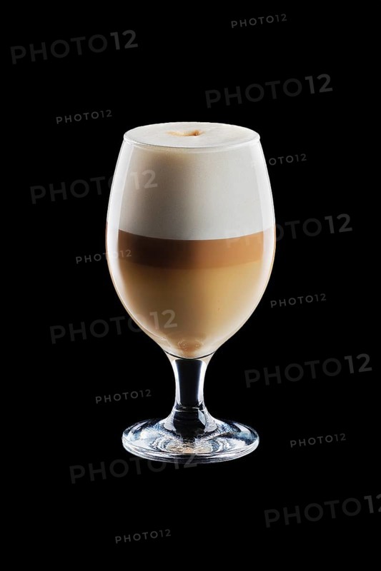 Big transparent glass with layered latte isolated on black background