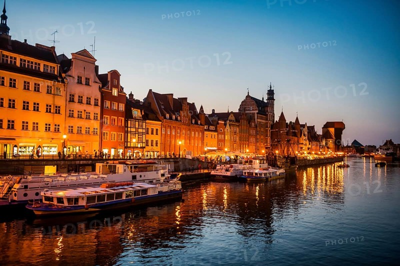 Hanseatic league houses on the Motlawa river at sunset