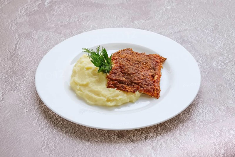 Fried hake fillet with spinach