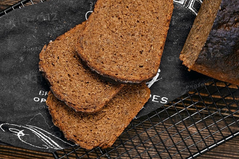 Overhead view of slices of artisan rye bread with rich texture