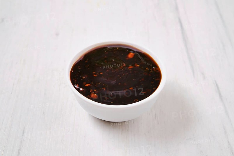 Small bowl with spicy teriyaki sauce