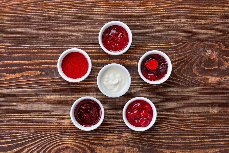 Overhead view of assortment of fruit puree. Jam