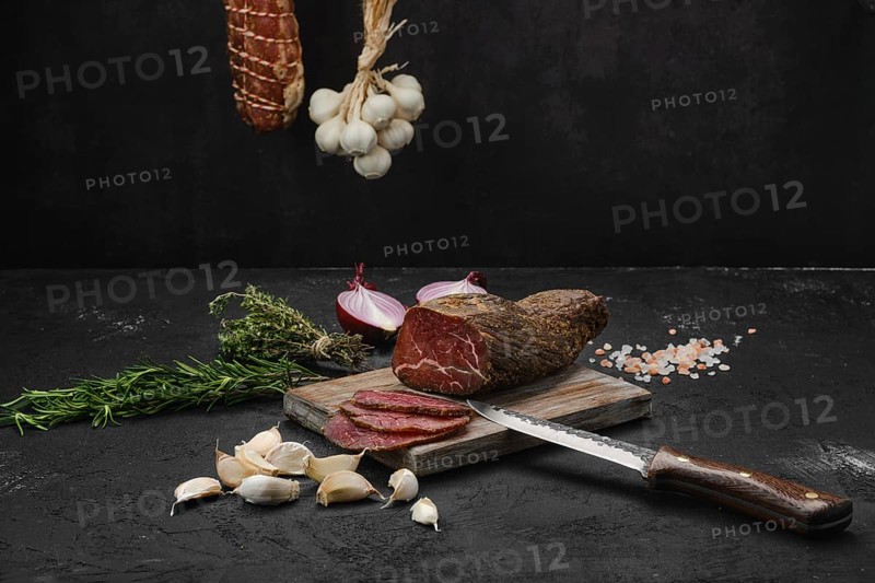 Beef jerky on wooden cutting board