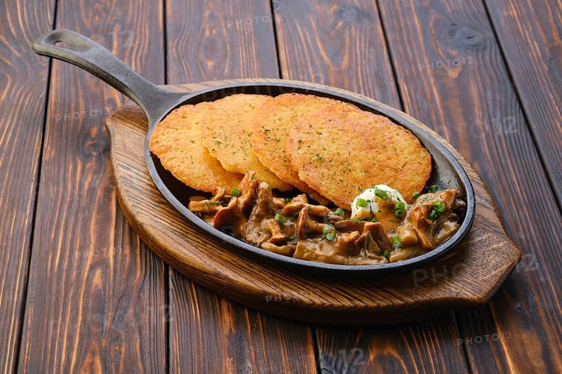 Cast iron skillet with fried chanterelles