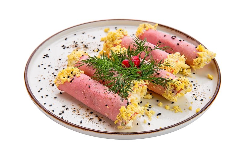 Delicious rolls made of ham stuffed with cheese
