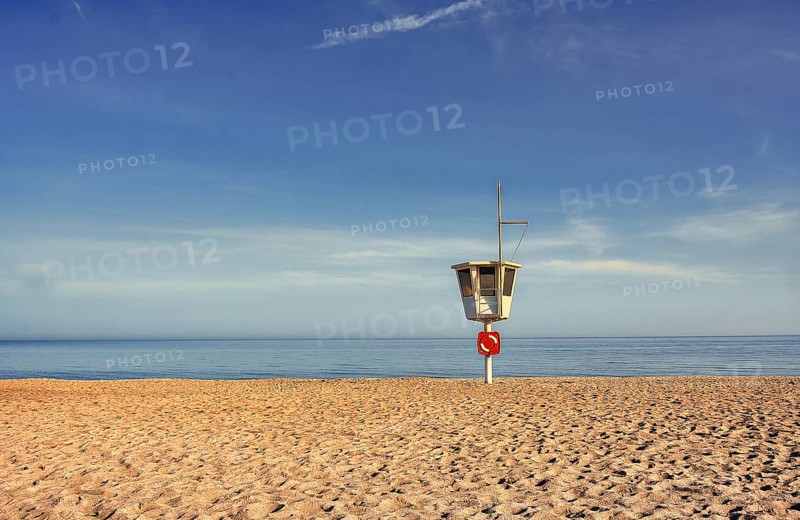 Rescue tower on the empty beach of the seaside resort of Dahme