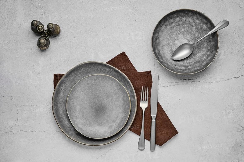 Set of grey ceramic plates and tableware