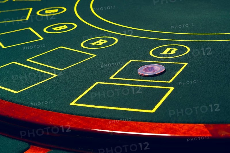 Casino poker table with chips and cards. Winning combination