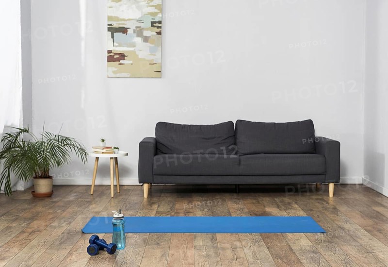Front view room interior with weights water bottle