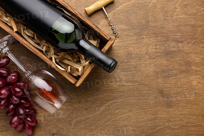 Top view wine bottle glass with grapes copy space. Resolution and high quality beautiful photo