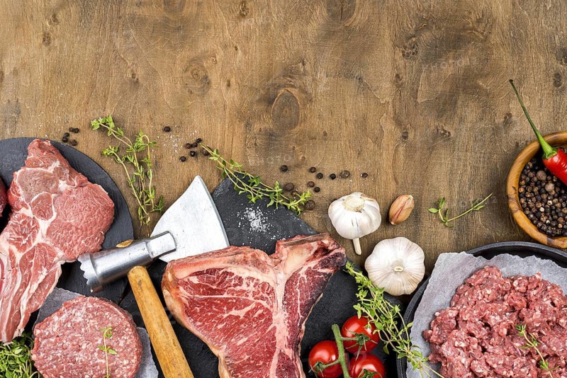 Top view of meat with garlic and herbs. Resolution and high quality beautiful photo