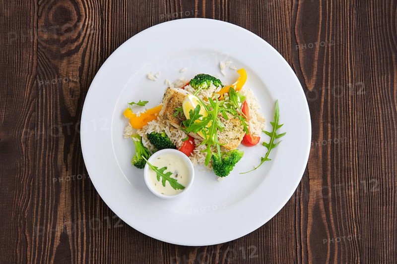 Top view of fried zander with rice
