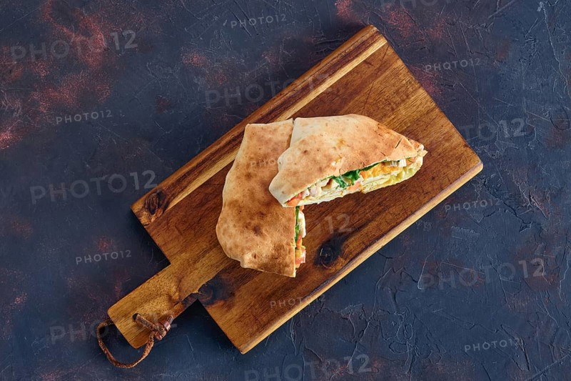 Top view of pita bread stuffed with chicken
