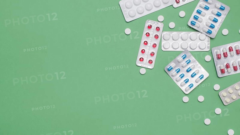 Top view pills frame green background. Resolution and high quality beautiful photo