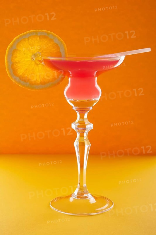 Scofflaw cocktail on orange background