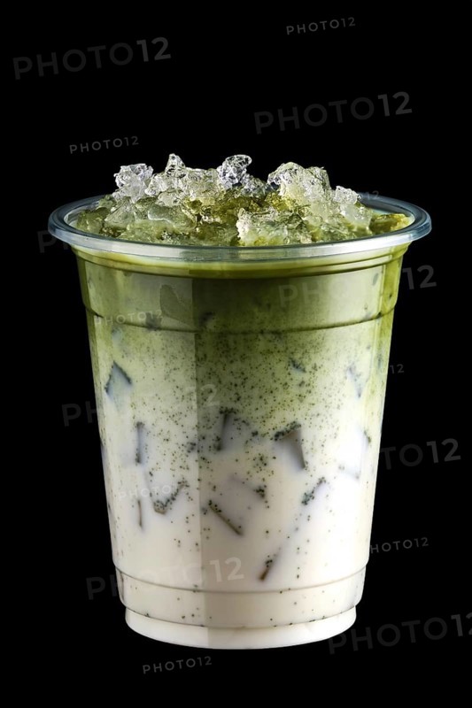 Iced matcha tea and crushed ice in take away cup isolated on black background