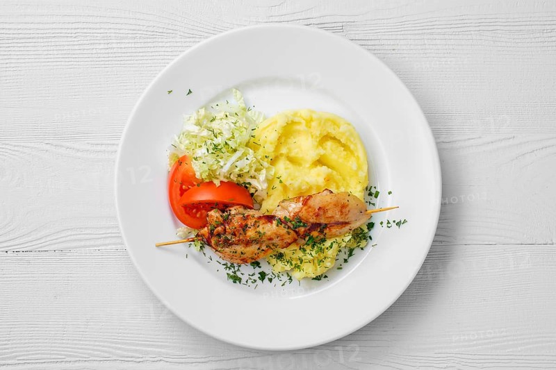 Top view of plate with chicken shashlik