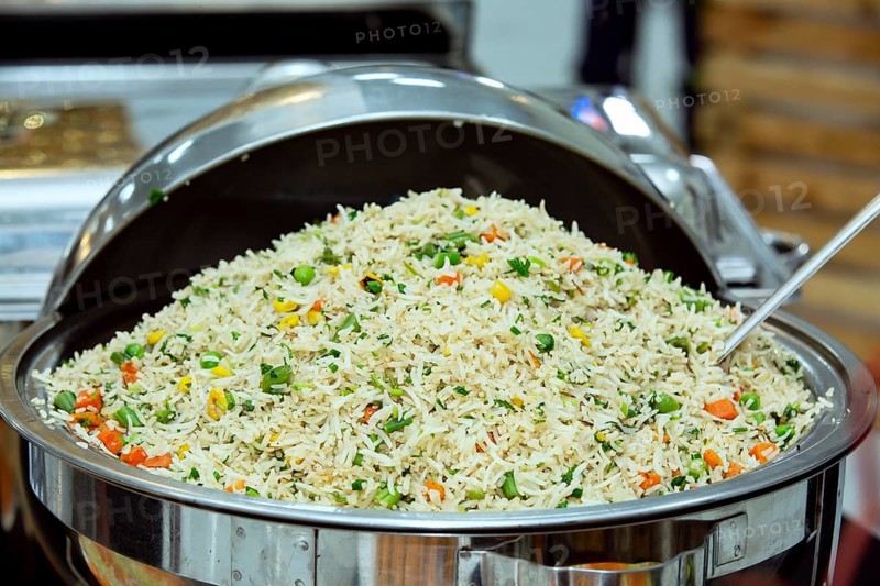 Cantonese style fried rice in a large bowl at a wedding reception