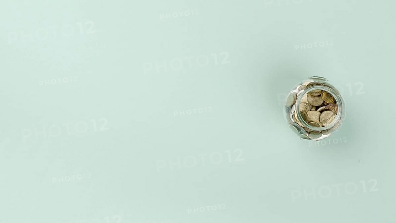 Flat lay jar with coins