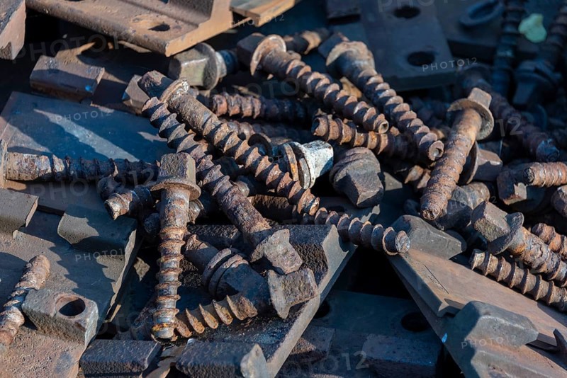 Rusty screws for fastening railway tracks
