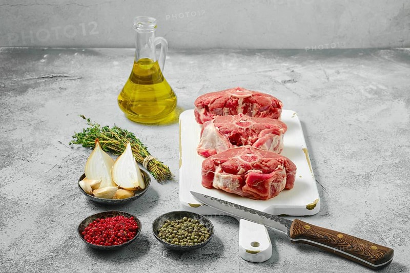 Raw fresh lamb saddle cut on sections