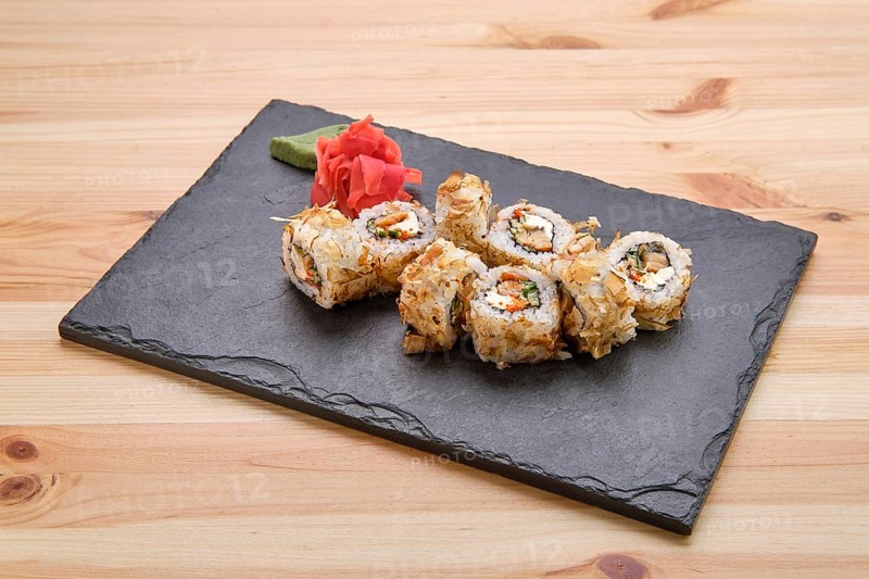 Rolls with tuna and avocado on slate plate