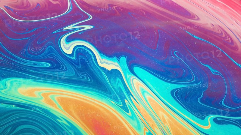 Gleaming wavy blue yellow pink abstract background