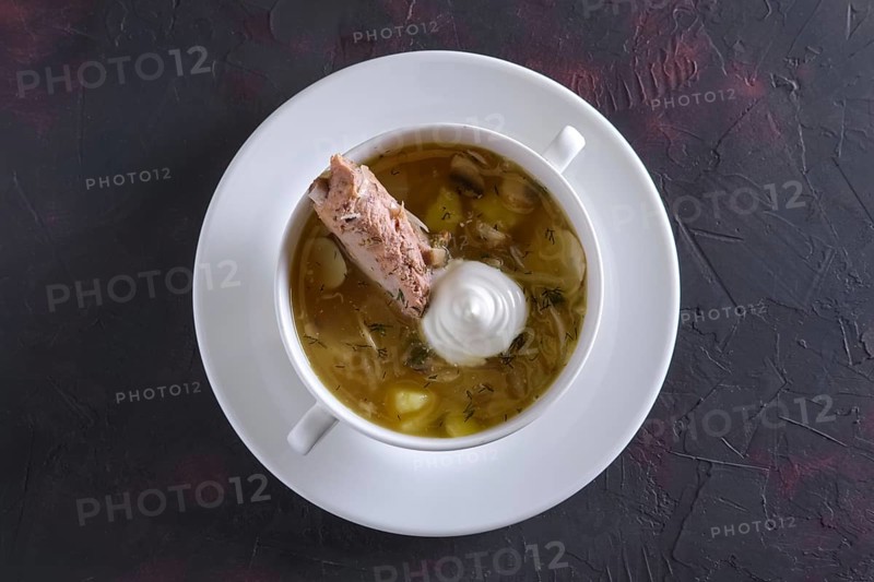 Beef bouillon with meat on a bone