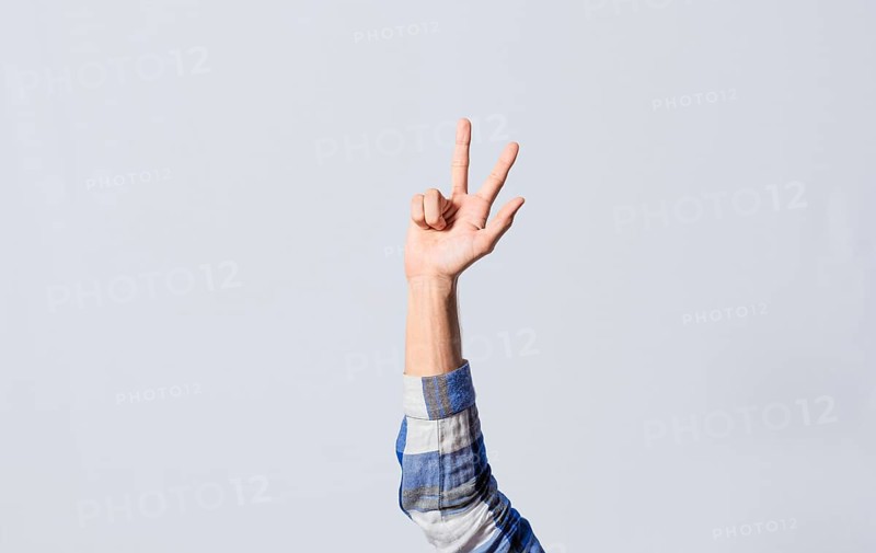 Number THREE in sign language. Deaf and dumb counting the number THREE in sign language