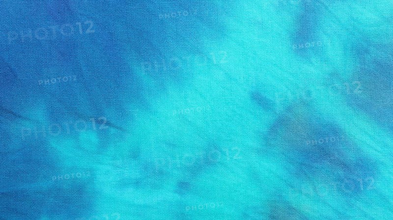 Gradient tie dye textile surface