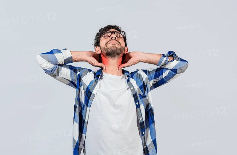 Young man with shoulder and neck problems