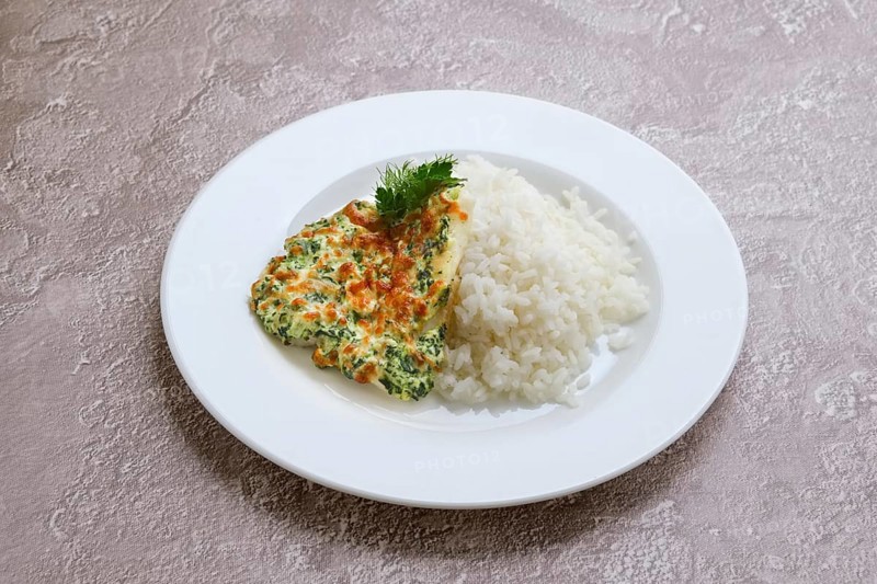 Fried hake fillet with spinach