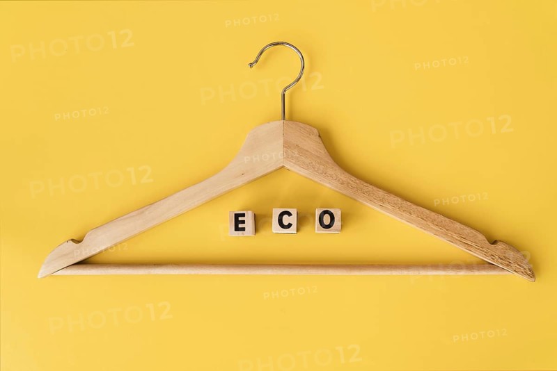 Top view wooden hanger with yellow background 1. Resolution and high quality beautiful photo