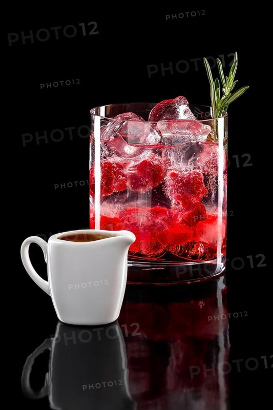 Espresso tonic refreshing drink isolated on black background