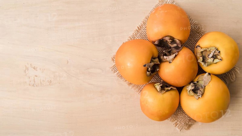 Top view tasty persimmons with copy space. Resolution and high quality beautiful photo