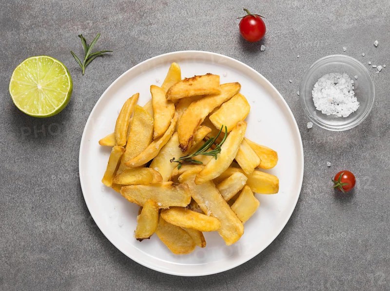 Top view french fries plate with salt tomatoes. Resolution and high quality beautiful photo