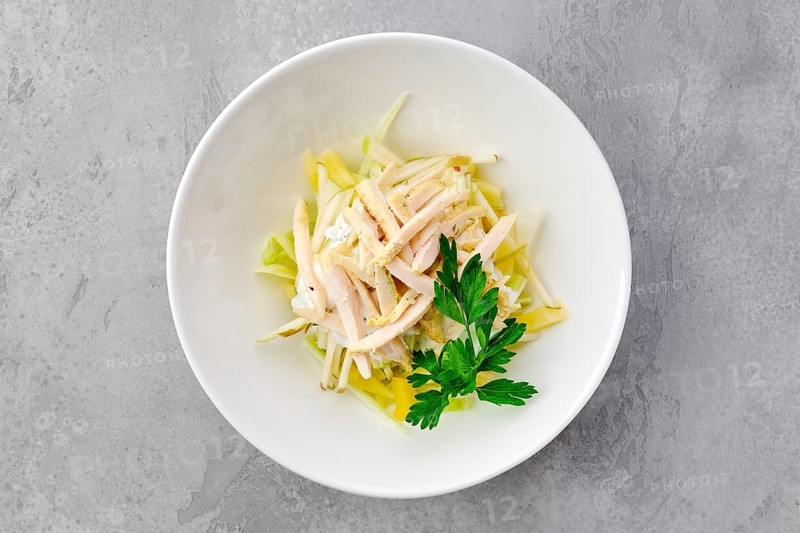 Top view of salad with ham