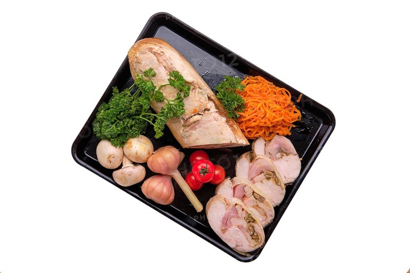 Meatloaf with mushrooms served with spicy carrot