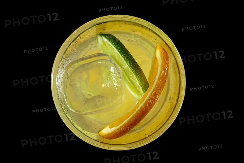 Cold Lemon cocktail with a sparkling wine with ice cubes in take away glass isolated on black