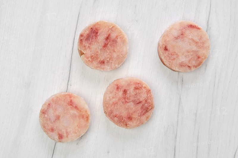 Frozen round fish cutlet for burger or frying