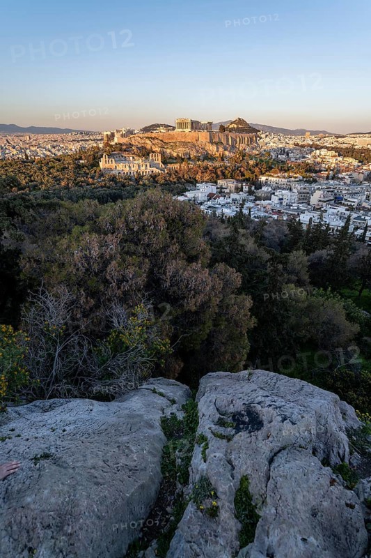 View from Philopappos Hill over the city at sunset