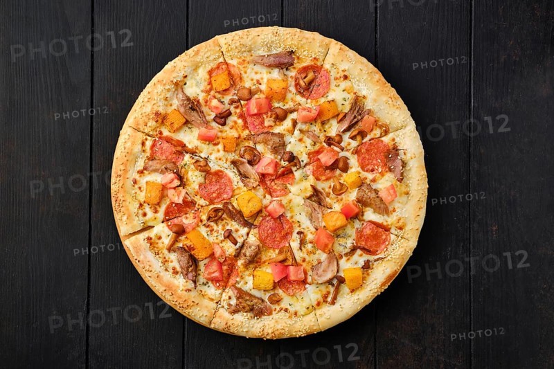 Top view of pizza with pumpkin
