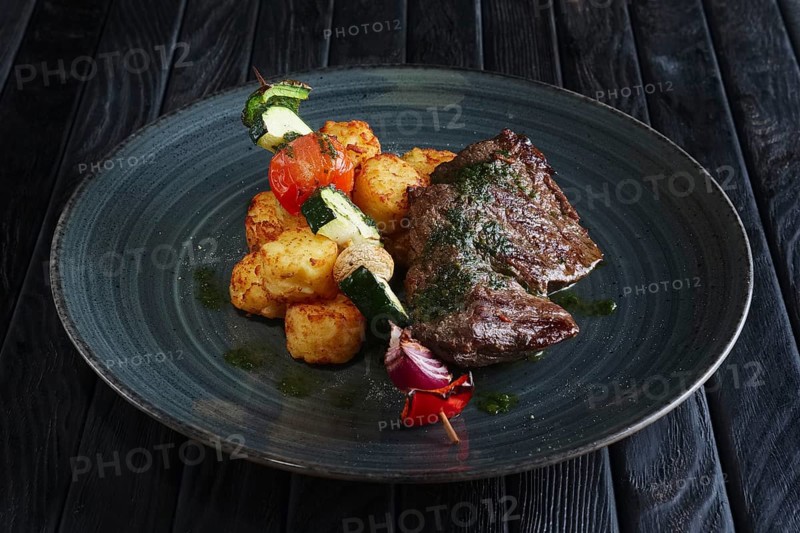 Juicy grilled beef fillet with potato