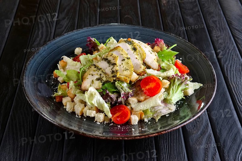Salad with fried chicken fillet