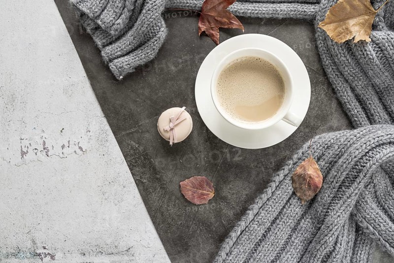 Coffee with milk warm sweater shabby surface
