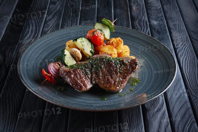 Juicy grilled beef fillet with potato