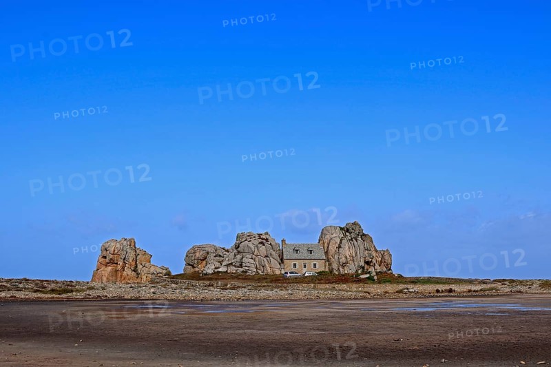 Country house between rocks near Le Gouffre